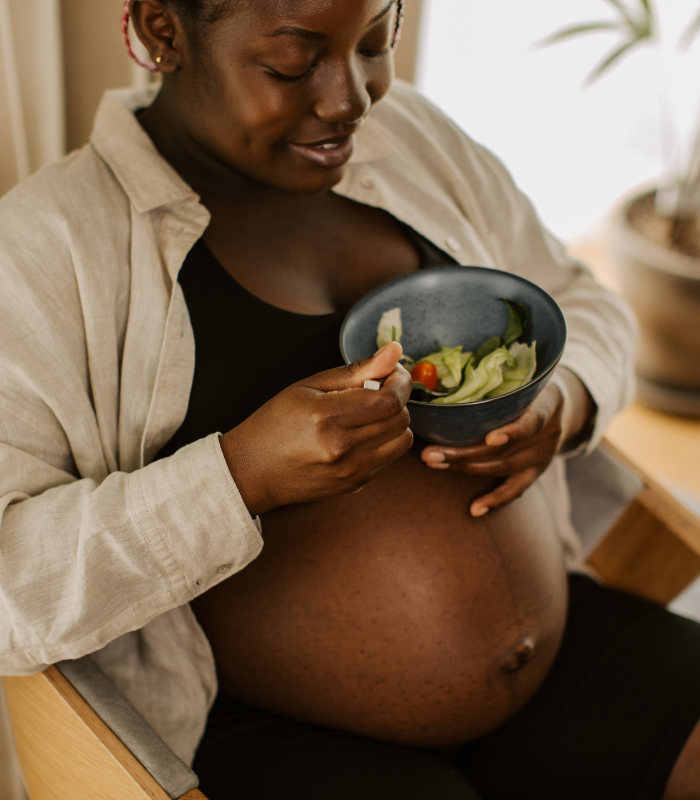 a pregnant woman happy after Perinatal Therapy